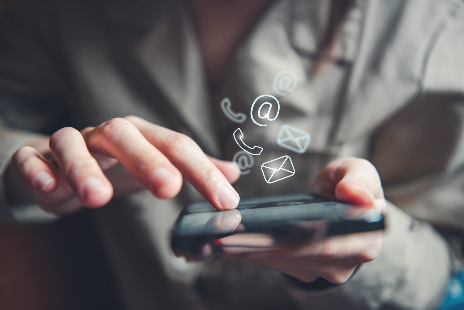 hand-woman-holding-mobile-smartphone-with-contact-us